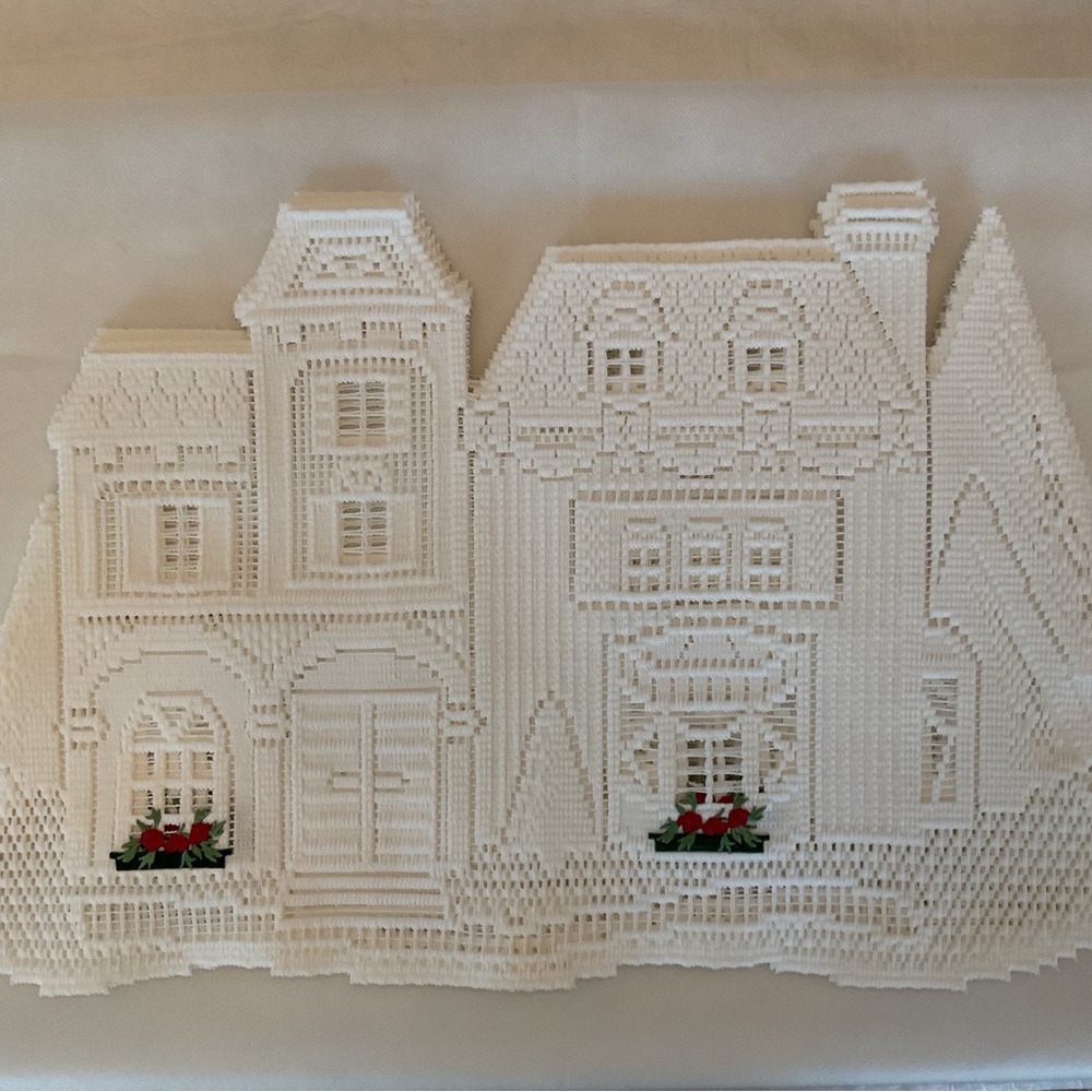 White Holiday House Lace placemats and runner.